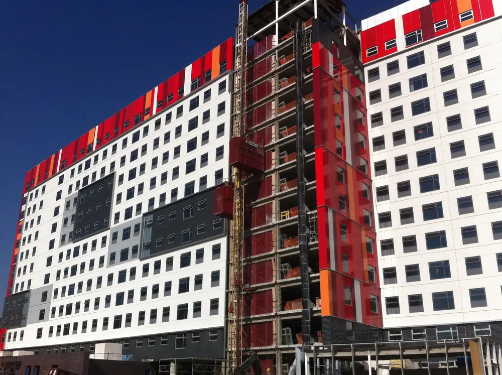 Office under construction with white and red exterior