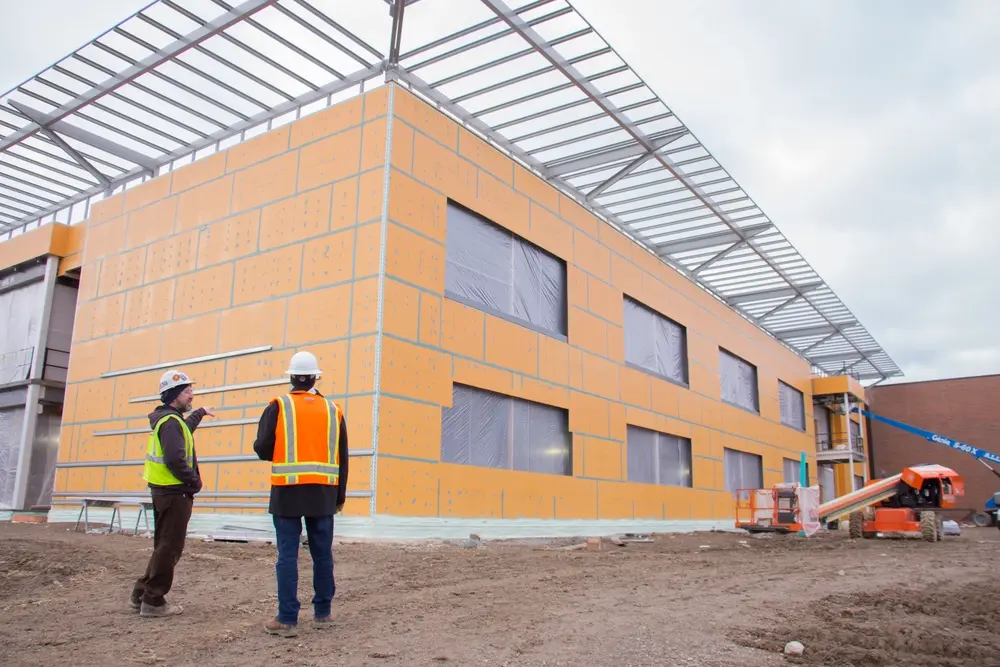 Construction of a university building with USG and Tremco Securock ExoAir 430 sheathing and air barrier