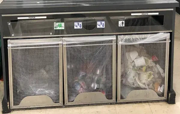 Recycling and waste bin in Tremco manufacturing facility